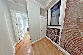 95 Perry St, Unit 1 in New York, NY - Foto de edificio - Building Photo