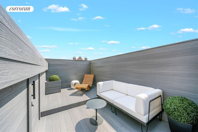 property at 158 W 136th St