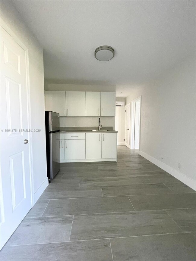 7013 NW 95th Terrace in Tamarac, FL - Building Photo - Building Photo