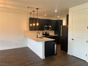 7584 Carnegie Way in Naples, FL - Building Photo - Building Photo