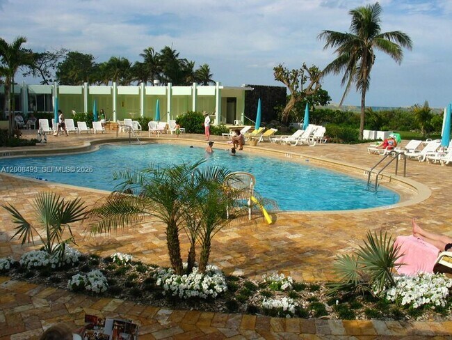 property at 5055 Collins Ave