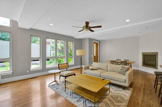 Contemporary Whittier home with wraparound deck in Denver, CO - Foto de edificio - Building Photo