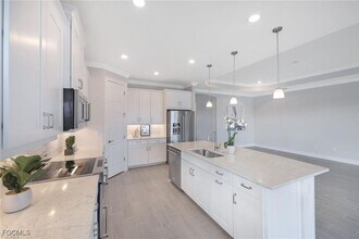 514 Kamari Cv in Naples, FL - Building Photo - Building Photo