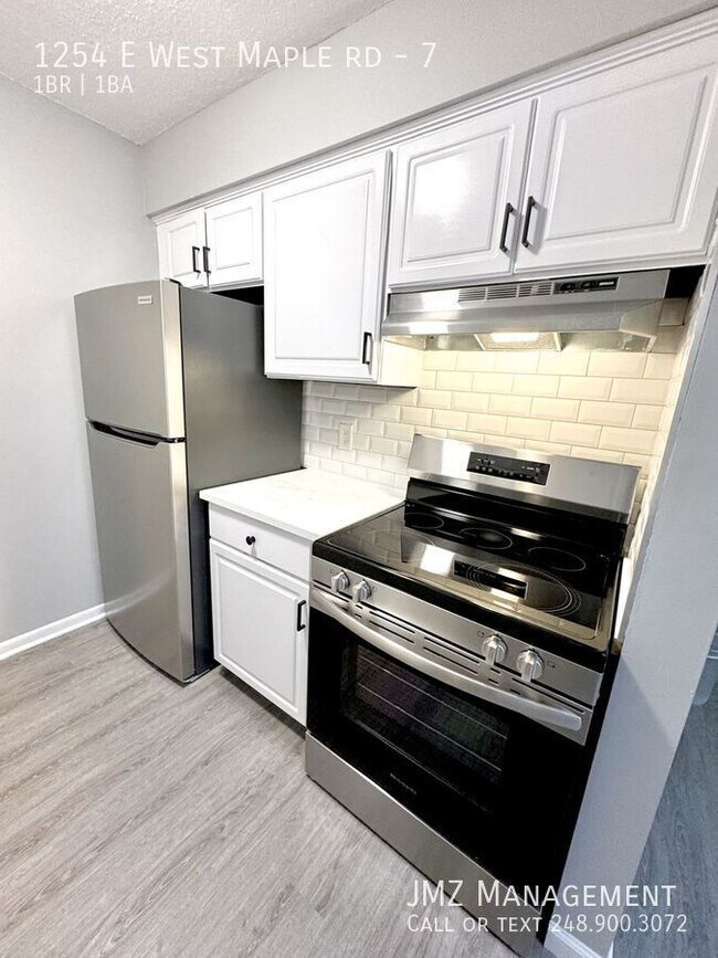1254 E West Maple Rd-Unit -7 in Walled Lake, MI - Building Photo - Building Photo