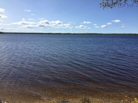 7990 Paradise Trl, Unit A in Carp Lake, MI - Building Photo