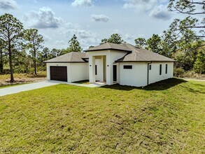 1707 McKinley Ave in Lehigh Acres, FL - Building Photo - Building Photo