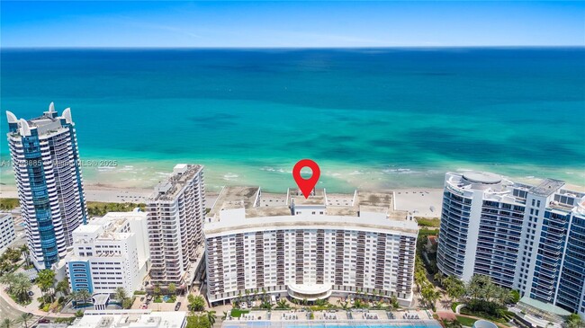 property at 6039 Collins Ave
