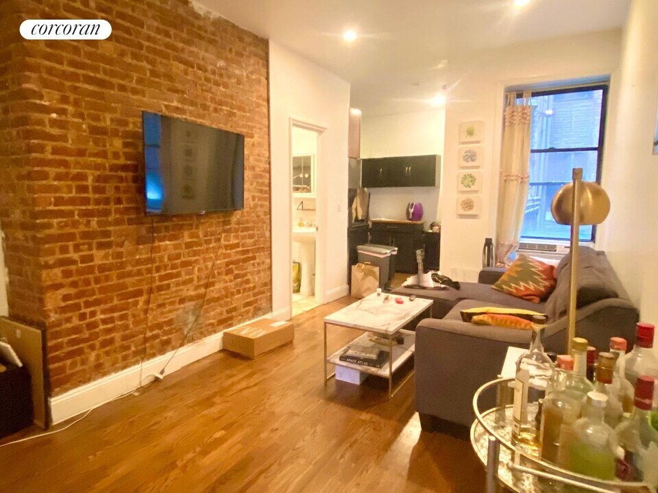235 E 4th St in New York, NY - Building Photo