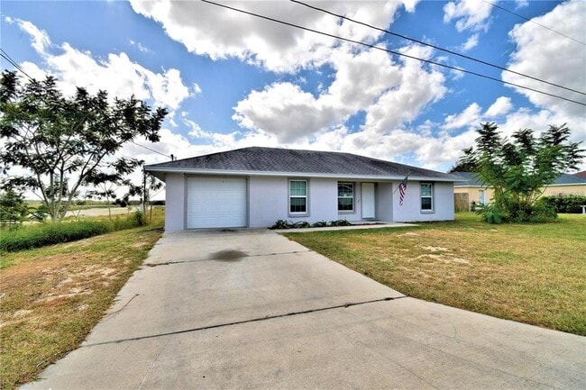 140 Weeping Willow Rd in Eagle Lake, FL - Building Photo - Building Photo