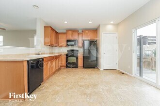 11833 E 111th Ave in Commerce City, CO - Building Photo - Building Photo