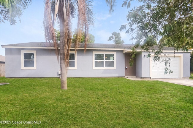 property at 2831 SE Melaleuca Blvd