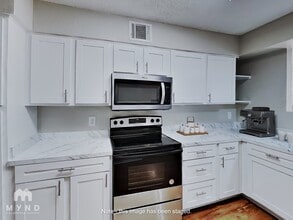 Del Estrado Townhomes in Lubbock, TX - Building Photo - Building Photo