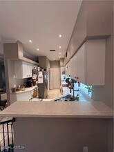 10728 Blue Bimini Cir, Unit 07-404G in Estero, FL - Building Photo - Building Photo