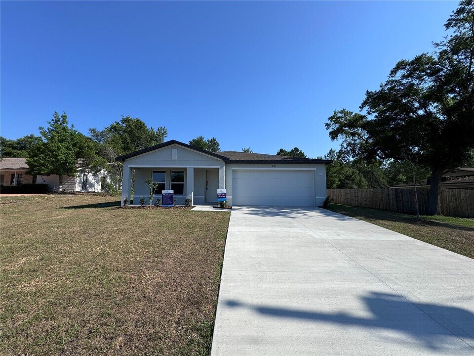 9131 Swiss Rd in Spring Hill, FL - Building Photo