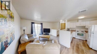 10605-10102 102 St in Grande Prairie, AB - Building Photo - Building Photo