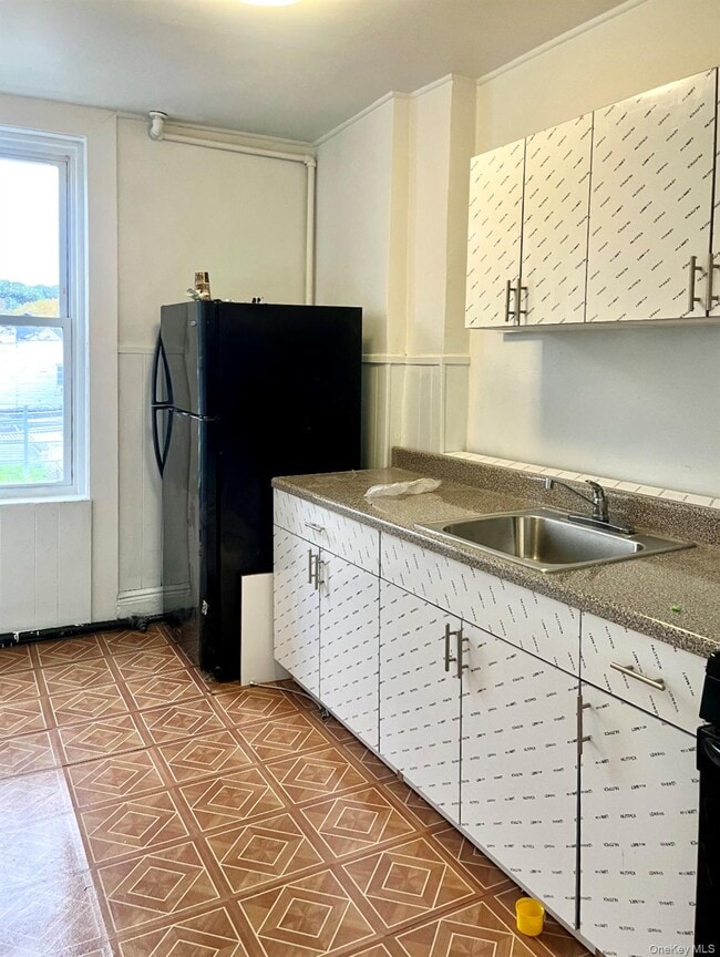 property at 88-15 Jamaica Ave