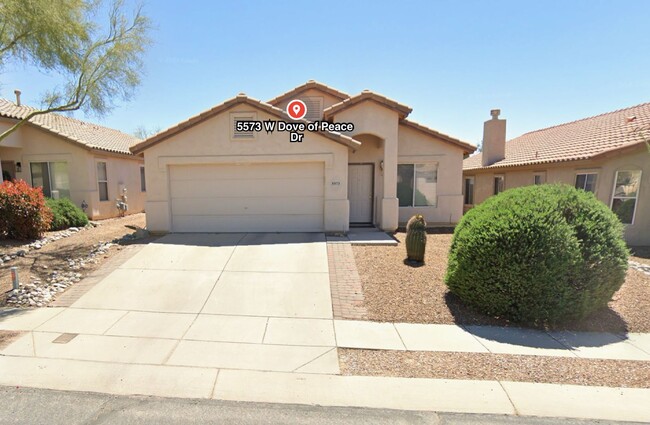 property at 5573 W Dove of Peace Dr