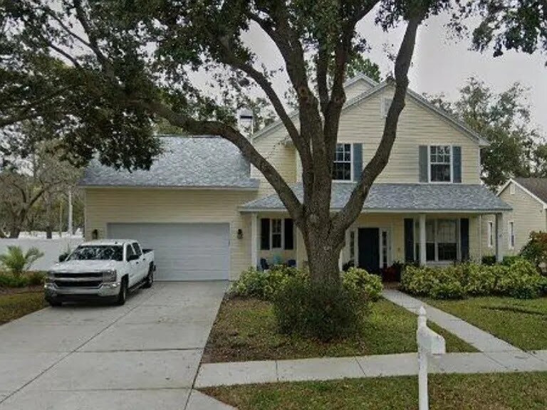 1005 Misty Hollow Ln in Tarpon Springs, FL - Building Photo