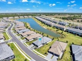 14087 Winding Cedar Wy in Miromar Lakes, FL - Building Photo