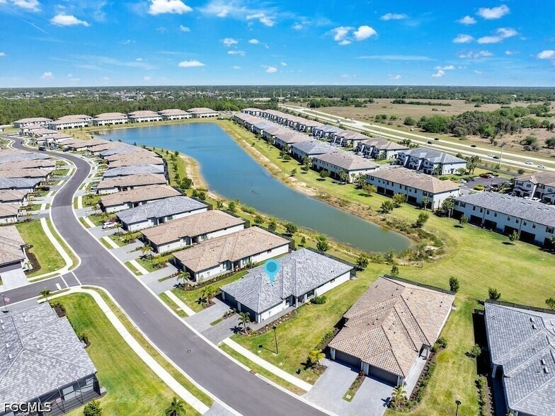 14087 Winding Cedar Wy in Miromar Lakes, FL - Foto de edificio
