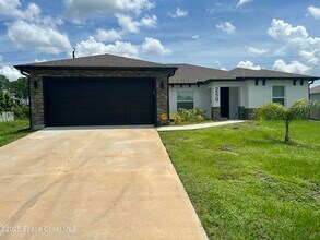 259 Wilton Ave SW in Palm Bay, FL - Building Photo - Building Photo