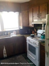 107 Woodland Ave-Unit -Rear in Avon By The Sea, NJ - Building Photo - Building Photo