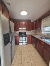 3837 215th St, Unit Fl 2 in Bayside, NY - Foto de edificio - Building Photo