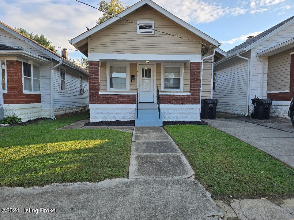 1234 W Woodlawn Ave in Louisville, KY - Building Photo