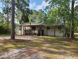 8405 Verano St in Navarre, FL - Building Photo