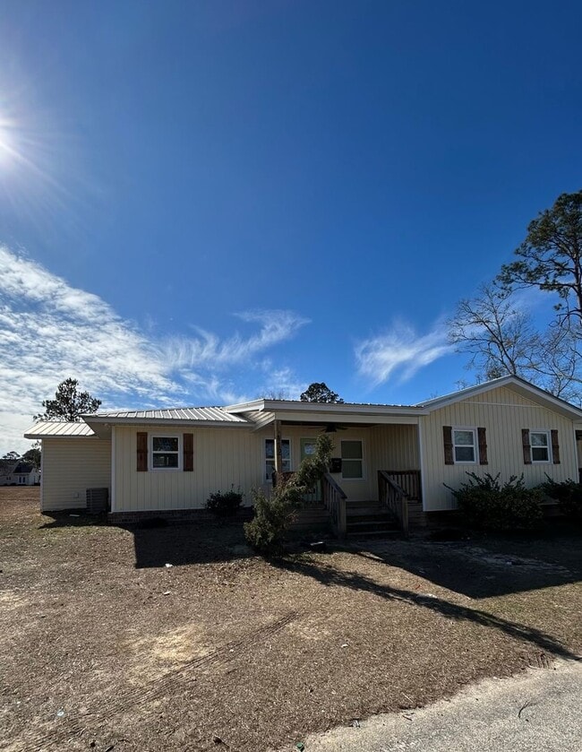 property at 112-114 W 10th St