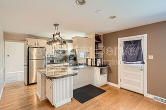 7603 E Bates Dr in Denver, CO - Building Photo - Building Photo