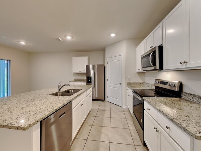 1417 Sugarwood St in Davenport, FL - Foto de edificio - Building Photo