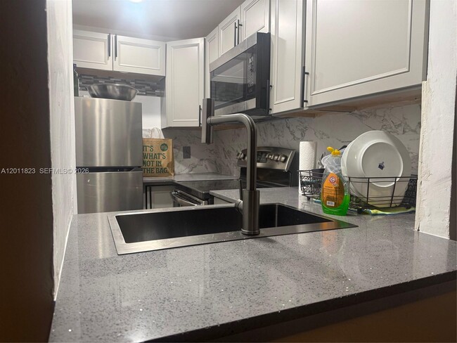 property at 7801 NE 4th Ct