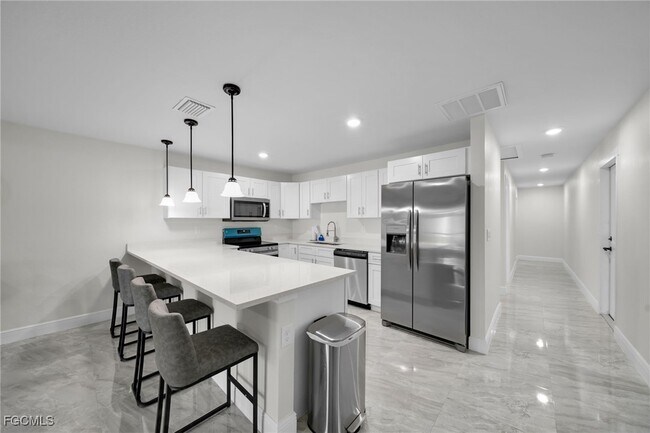 901 Albany Ave in Lehigh Acres, FL - Building Photo - Building Photo