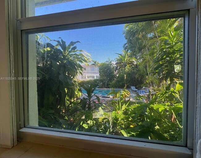 property at 1211 100th St