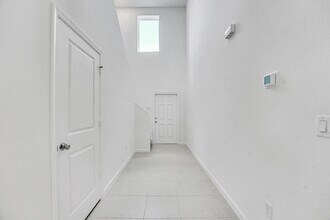 5908 NW Fairfax Ave in Port St. Lucie, FL - Building Photo - Building Photo