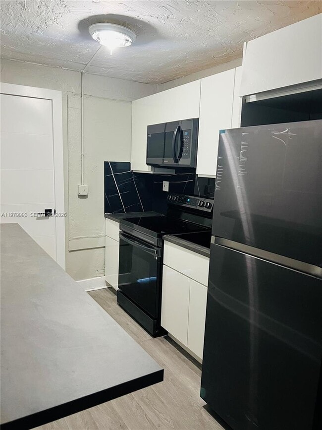 1126 NW 58th Terrace in Miami, FL - Foto de edificio - Building Photo