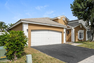 5262 NW 55th Terrace in Coconut Creek, FL - Building Photo - Building Photo