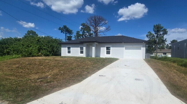 53 Colin Ave S in Lehigh Acres, FL - Building Photo - Building Photo