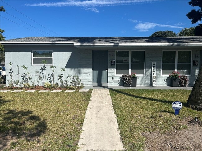 property at 5880 NW 19th St