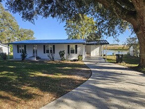 9007 Golden Gate Blvd in Polk City, FL - Building Photo - Building Photo