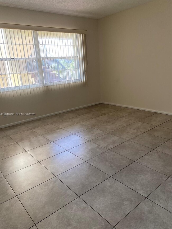 property at 13055 SW 15th Ct
