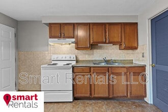 1030 Wild Cherry Ln in University City, MO - Building Photo - Building Photo