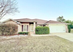 5659 Tiger Woods Dr in Milton, FL - Building Photo