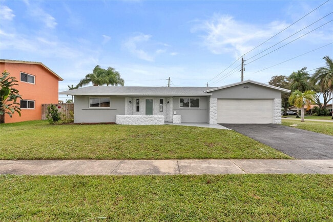 property at 4490 NW 8th St