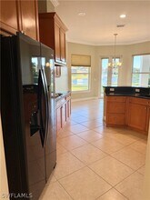 5031 Rustic Oaks Cir in Naples, FL - Building Photo - Building Photo