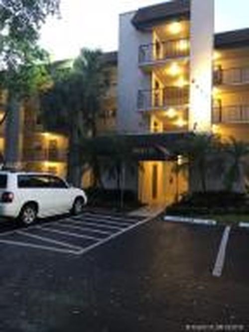 9450 Poinciana Pl-Unit -405 in Davie, FL - Building Photo - Building Photo