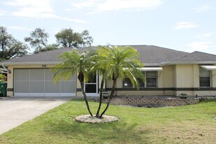1114 Presque Isle Dr in Port Charlotte, FL - Building Photo