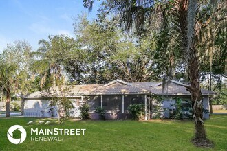 6889 Dodge Rd in Port Saint John, FL - Building Photo - Building Photo
