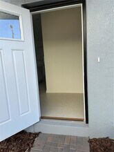 8795 Coqui Song Ln in Land O Lakes, FL - Foto de edificio - Building Photo